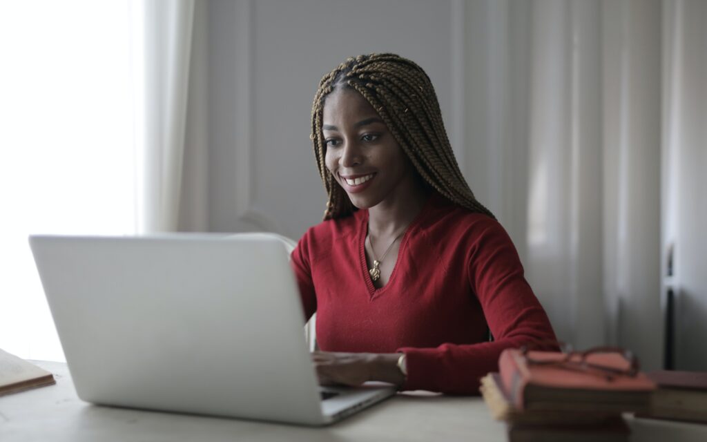 Woman sited at a desk in